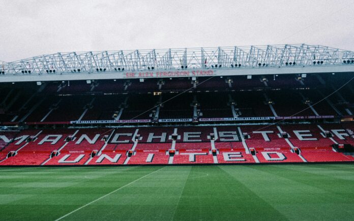 An inside pic of Manchester United football stadium.